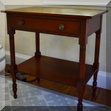 F33. 1-Drawer nightstand with lower shelf. Some wear to top.